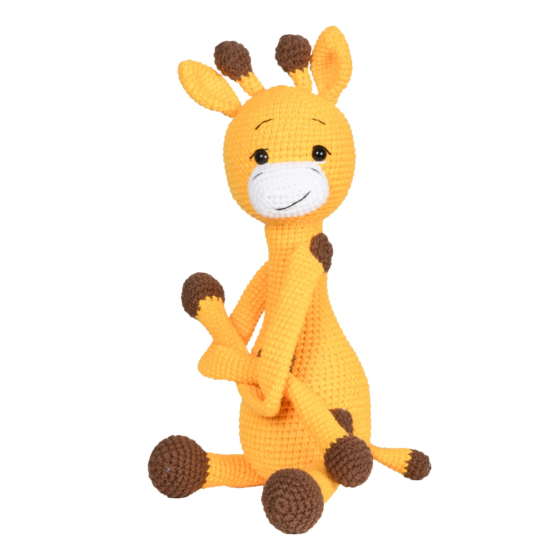 Handmade crochet amigurumi toy of a cute giraffe with a long neck and delightful details.