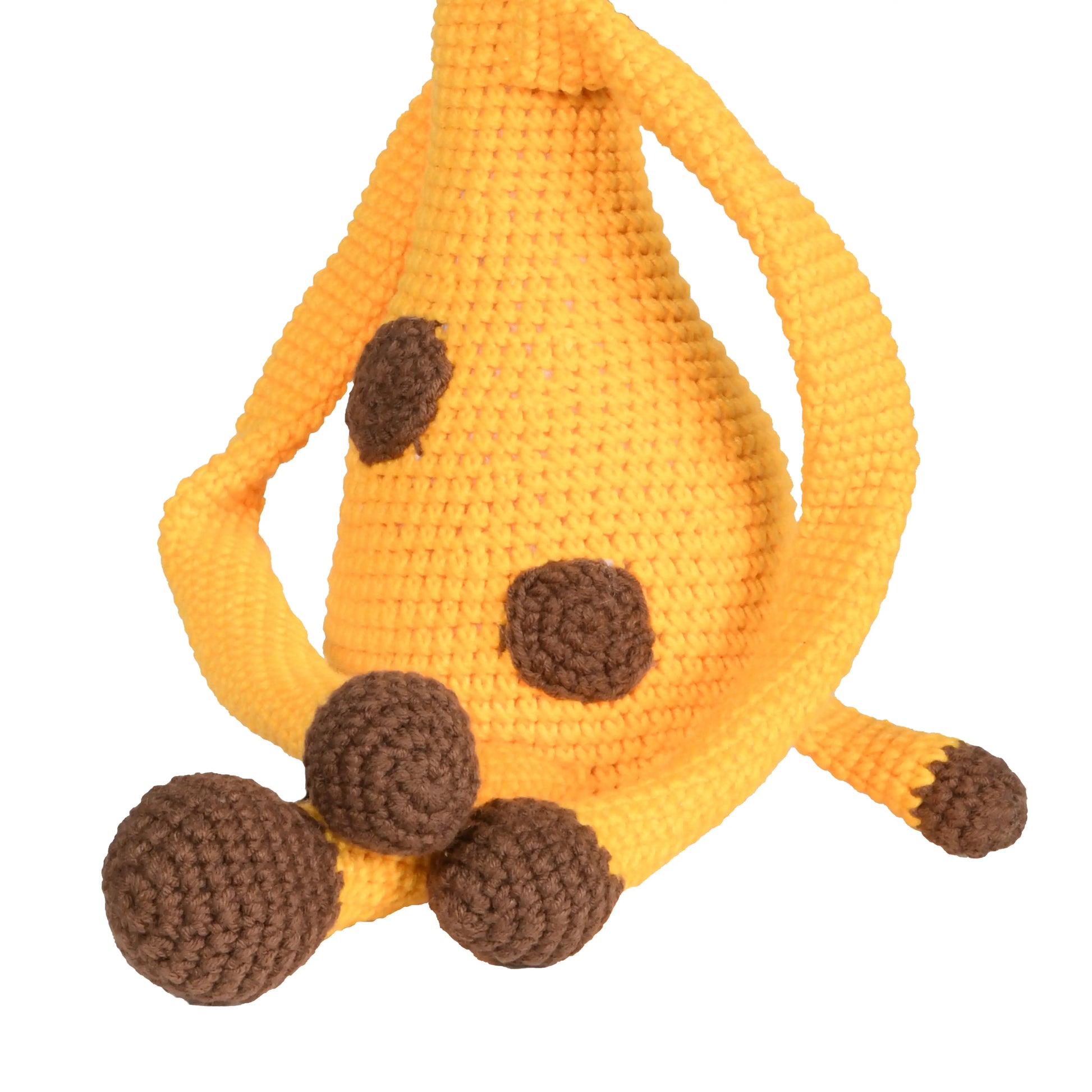 Handmade crochet amigurumi toy of a cute giraffe with a long neck and delightful details.