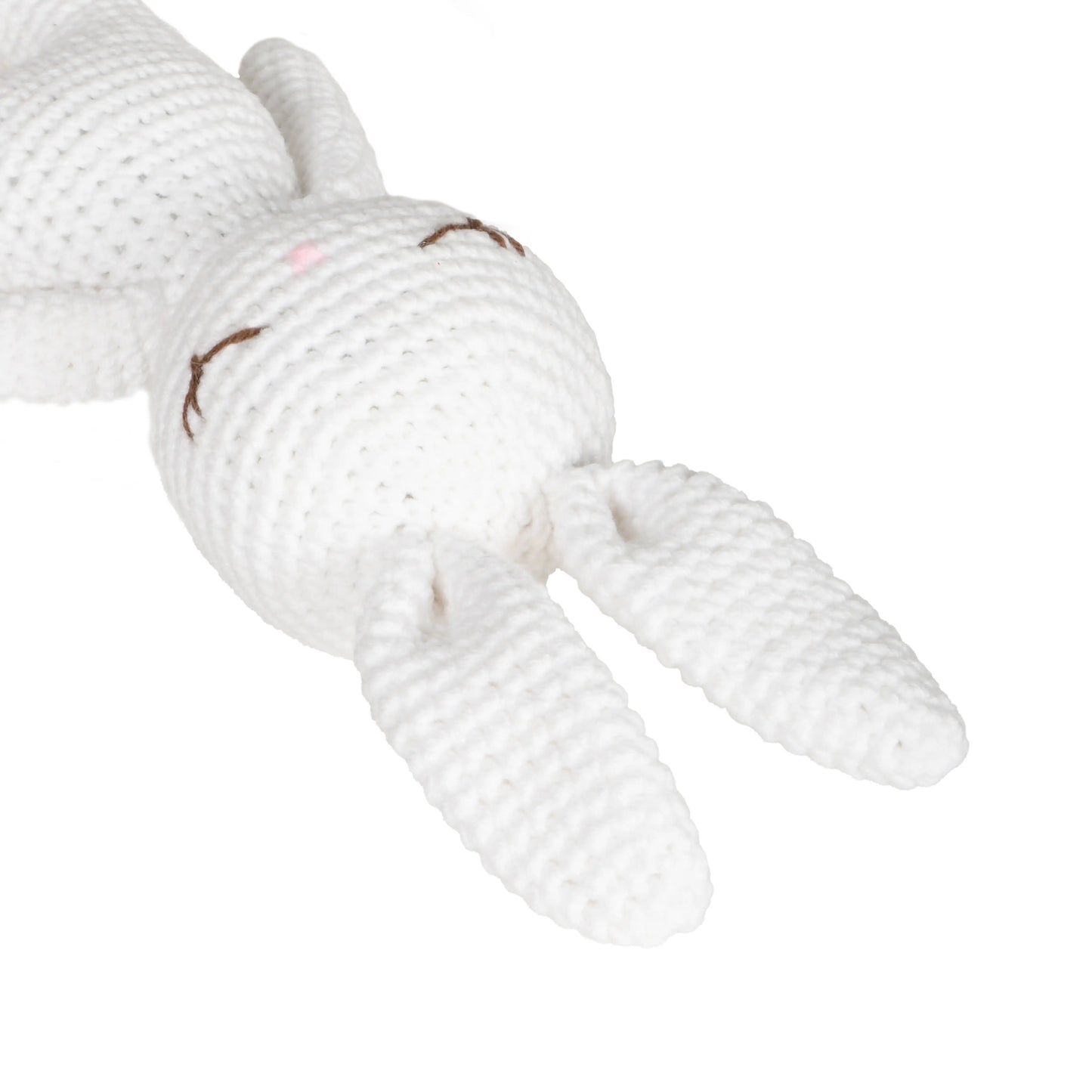 Handmade crochet amigurumi toy of an adorable white bunny with floppy ears and charming details