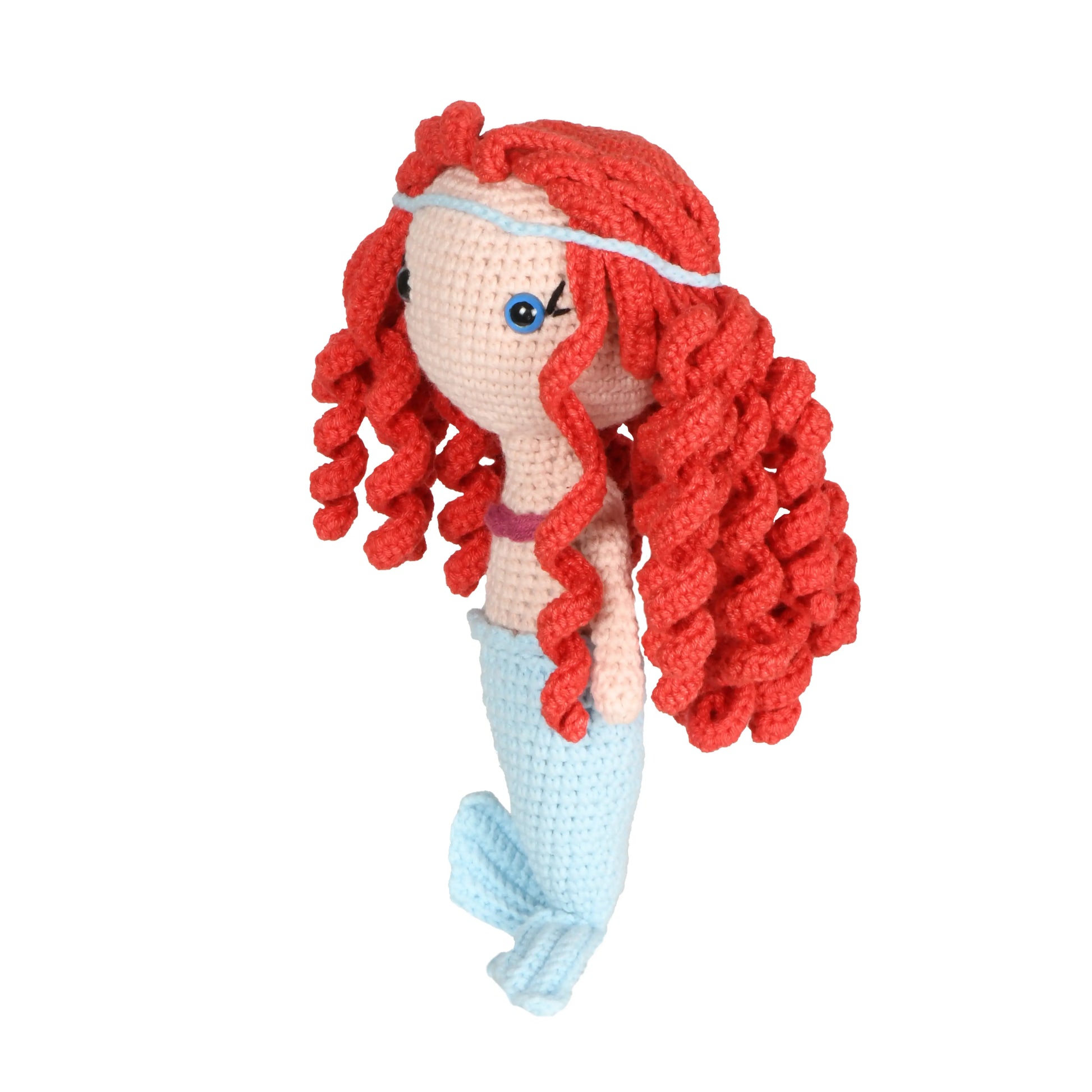 Handmade crochet mermaid amigurumi toy with long blue tail, pink seashell bikini, and flowing red hair.